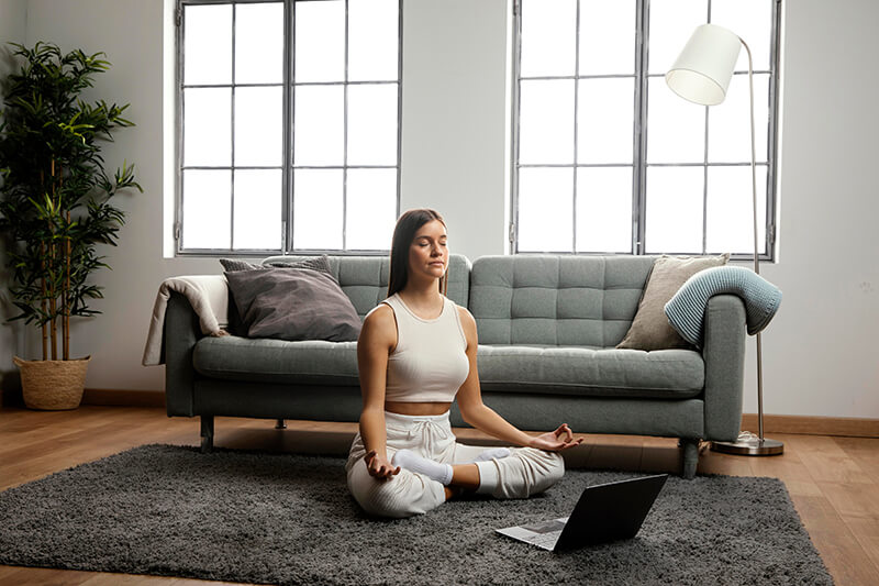 A photo of a woman doing meditation