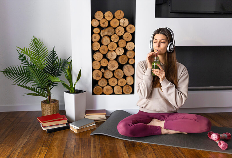 Photo of a woman drinking smoothie