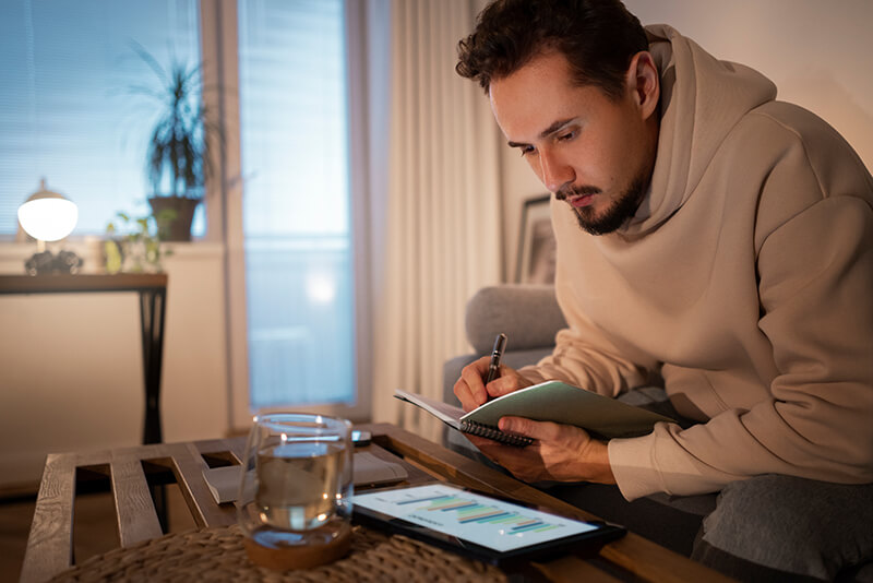 Photo of a man working from home