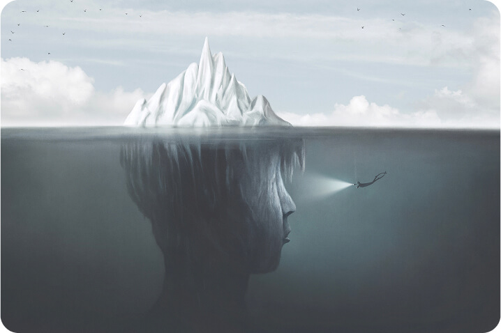 A photo if an iceberg with a human face
