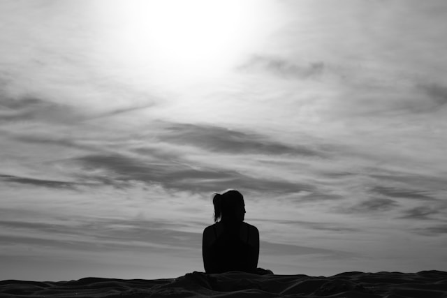 A photo of a person silhouette against the sky