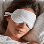 Person sleeping peacefully in a calm bedroom, symbolizing better sleep after quitting alcohol with UM.app hypnotherapy and movement techniques.